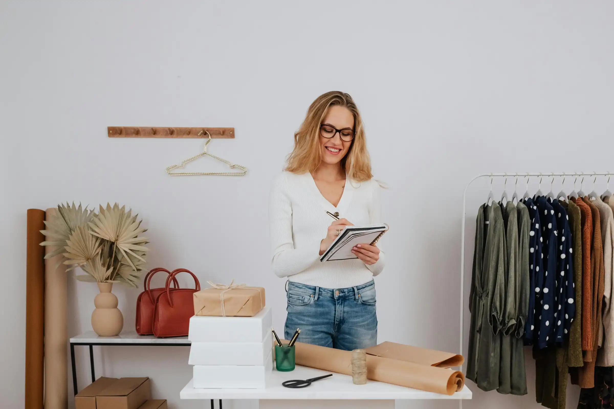 Boutique shop owner working in her store